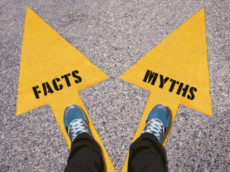 Feet standing on myths and facts arrows