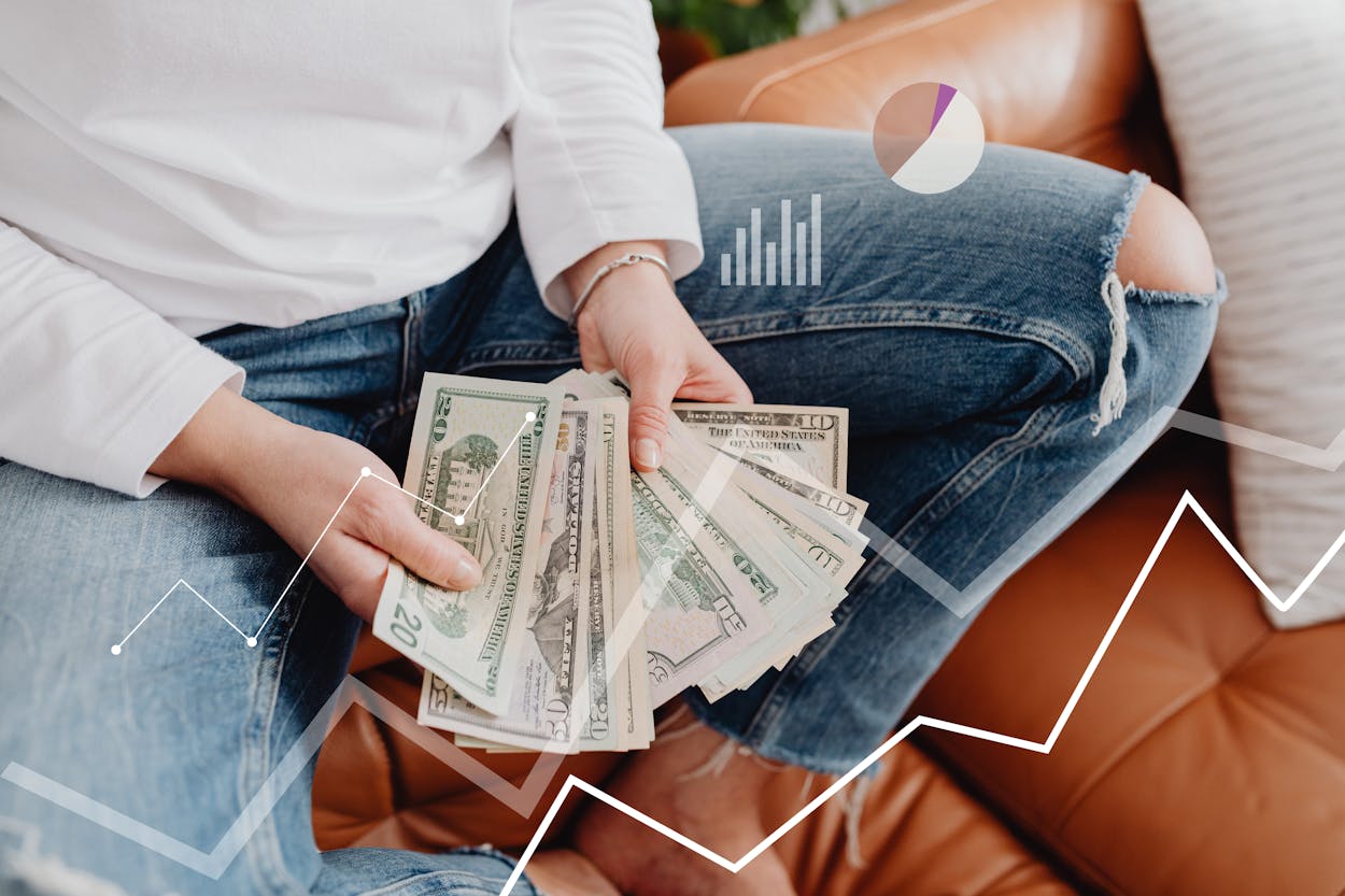 Close up shot of a person holding bills